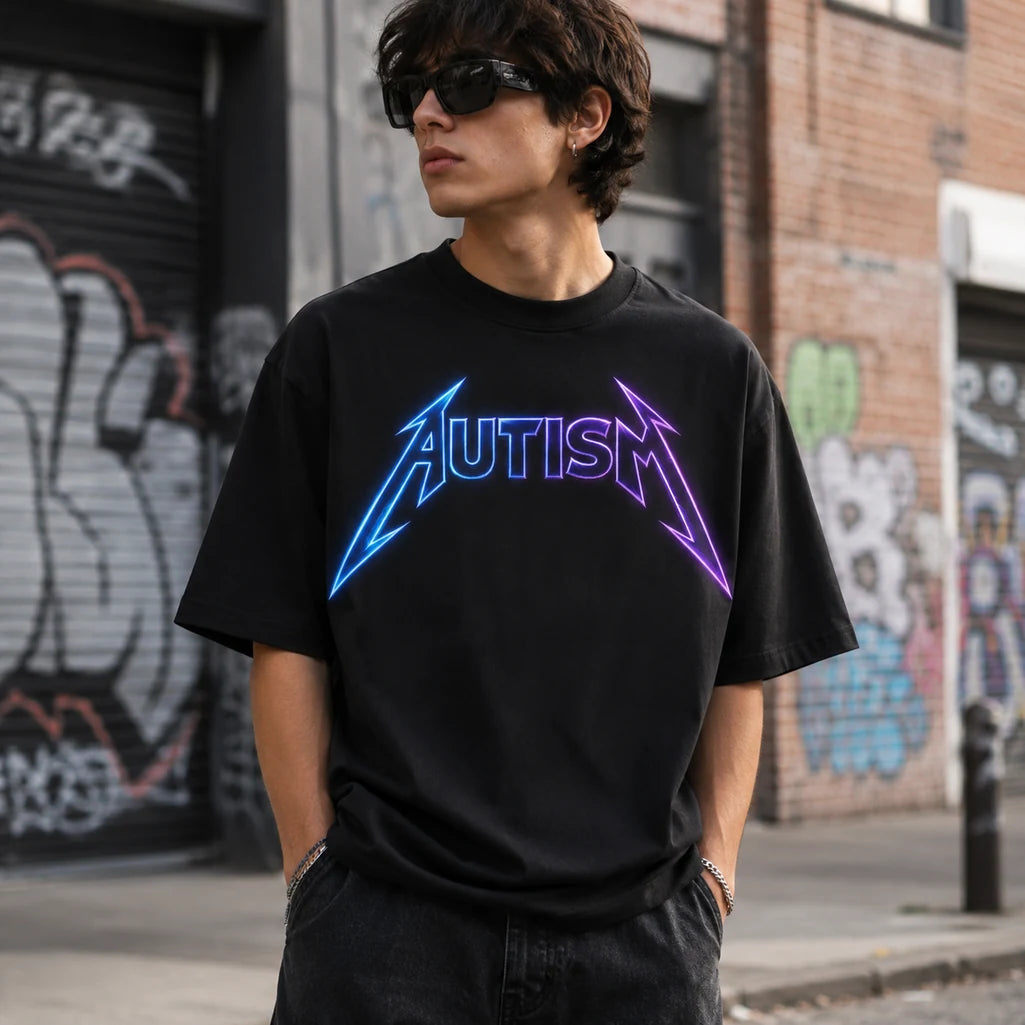 Male model wearing autism neon blue and purple graphic black T-shirt