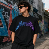 Male model wearing autism neon graphic black T-shirt in graffiti alley