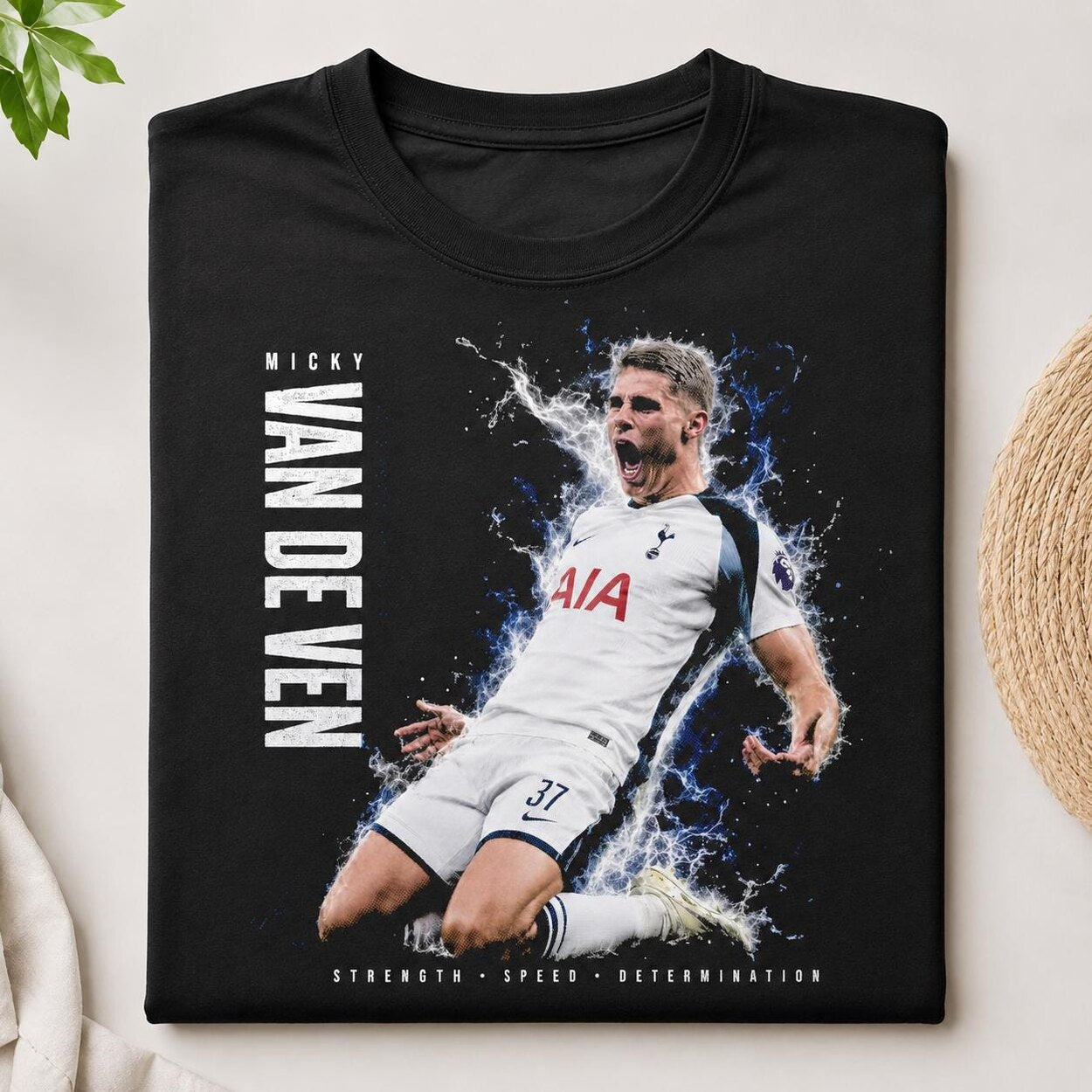 Folded black Micky van de Ven football fan T-shirt