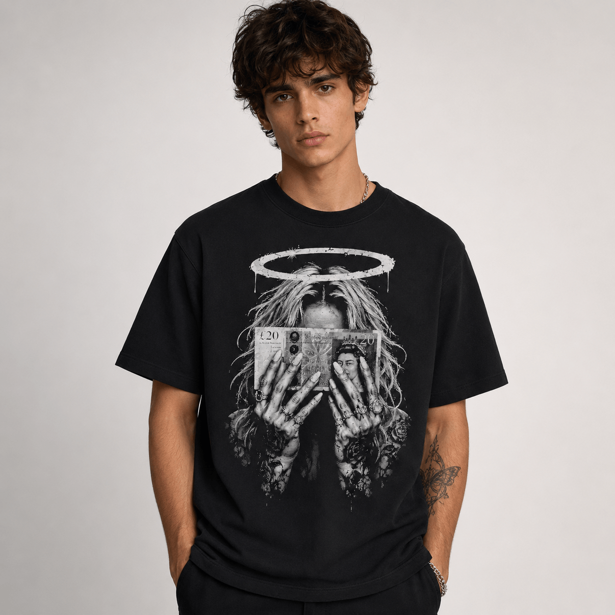 Male model wearing money halo gothic black graphic T-shirt