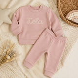 Soft pink personalised tracksuit flat lay