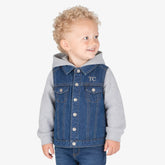Child wearing personalised embroidered denim jacket