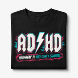 Printora UK black cotton t-shirt with neon pink and turquoise ADHD Highway to Hey Look a Squirrel graphic print