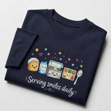Printora UK navy blue heavyweight cotton t-shirt featuring a cute Serving Smiles Daily school lunch graphic print