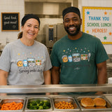 Printora UK school kitchen staff wearing Serving Smiles Daily graphic t-shirts in heather grey and moss green