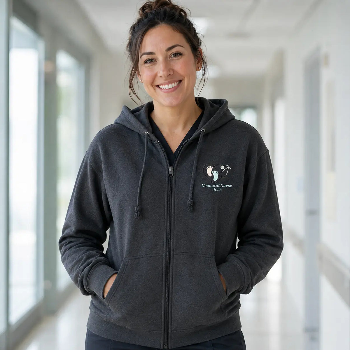 Model wearing Dark Grey NHS Neonatal Nurse footprint embroidered hoodie