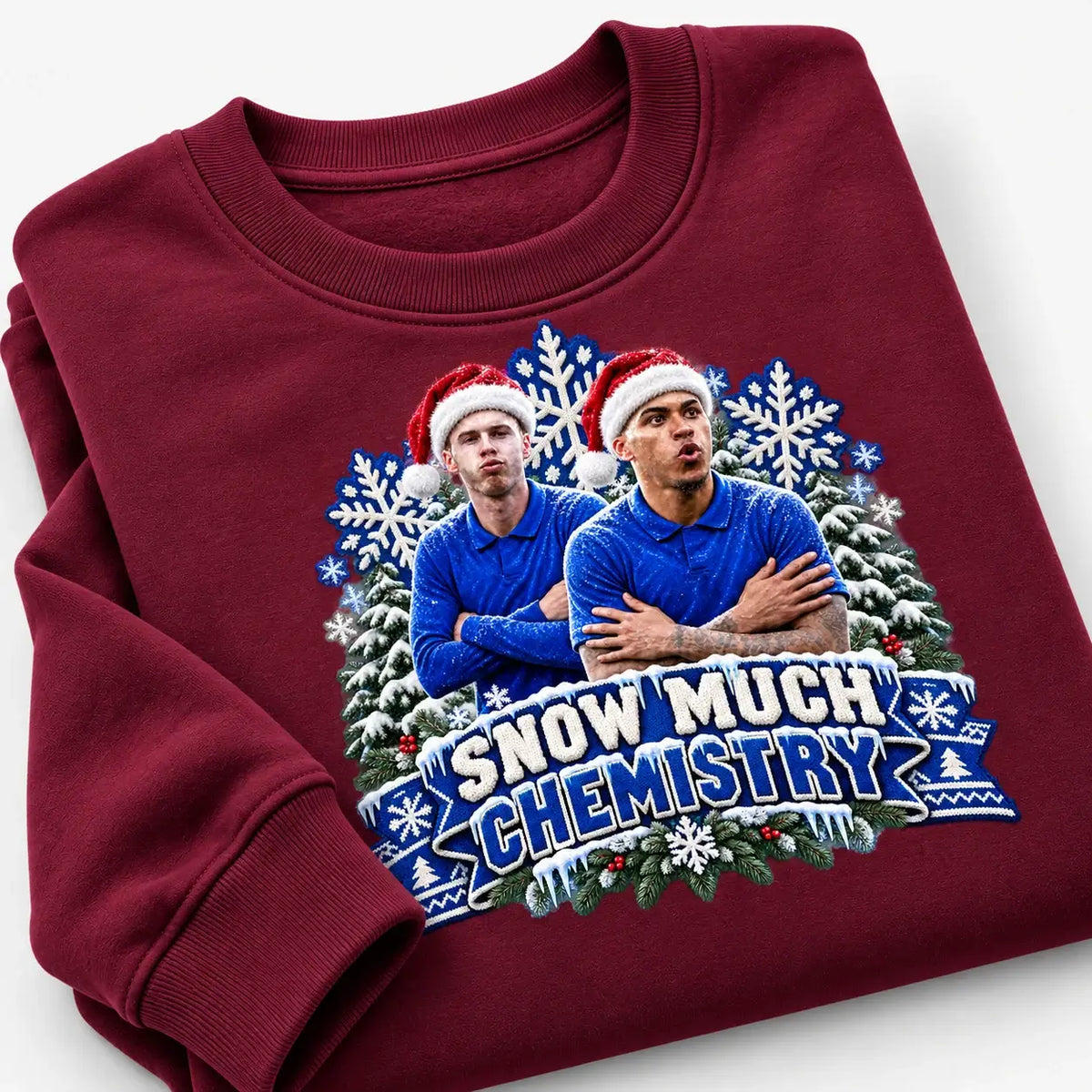 Burgundy Snow Much Chemistry Christmas jumper featuring Cole Palmer and Morgan Rogers, close folded flat lay