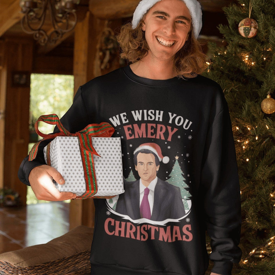 Man wearing Unai Emery We Wish You Emery Christmas crew-neck jumper while holding a present