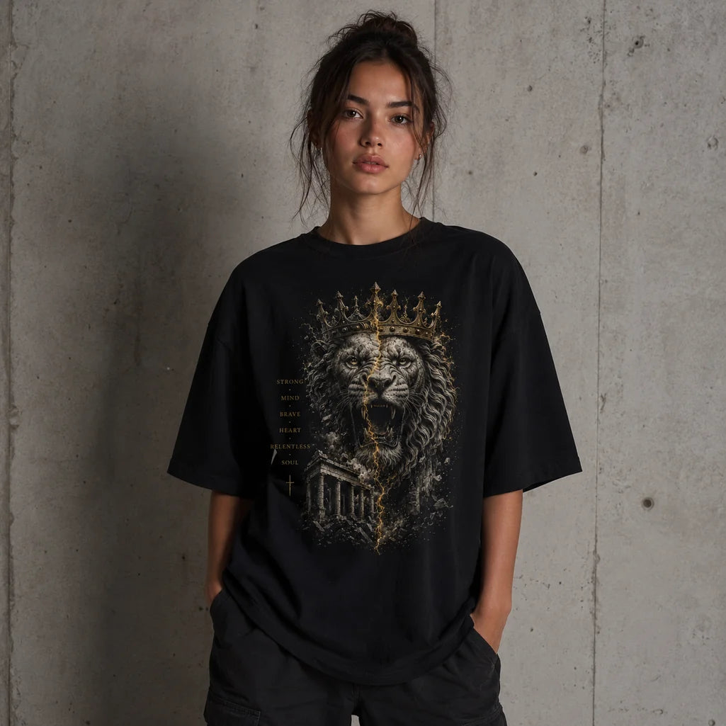 Female model wearing Crowned Lion gold and black graphic T-shirt
