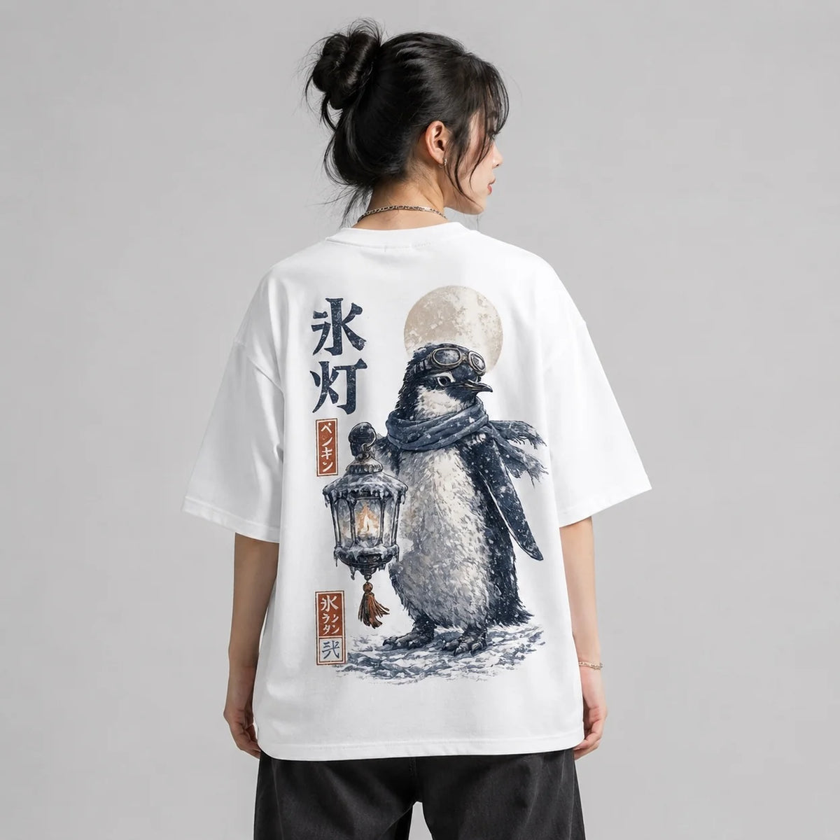 Model wearing Penguin Ice Lantern Japanese graphic T-shirt from the back