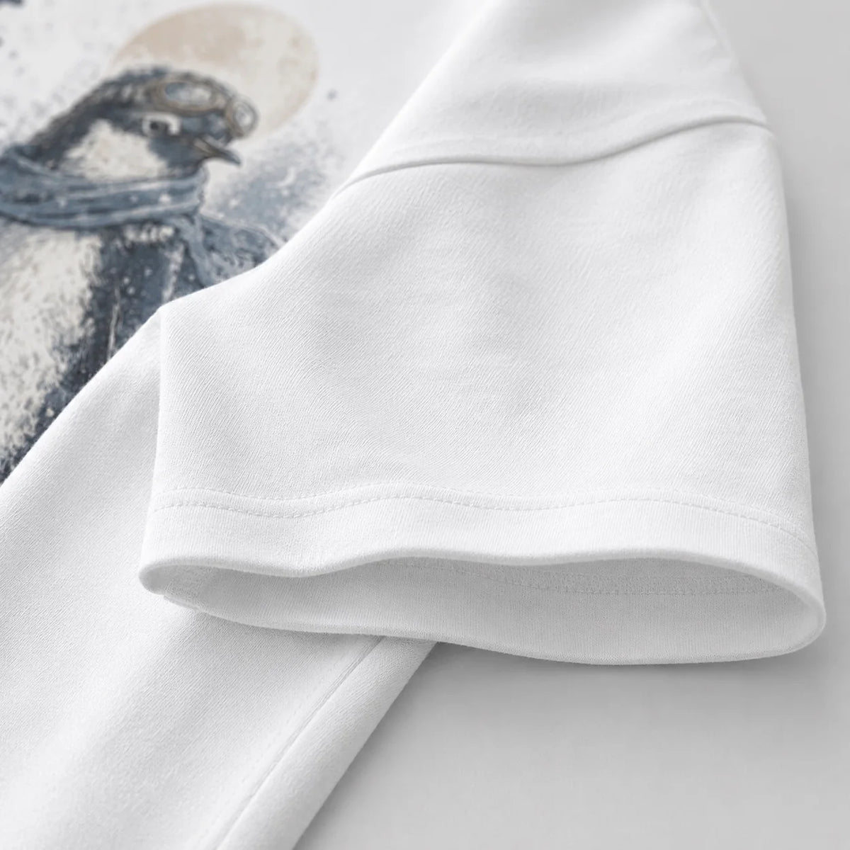 Penguin Ice Lantern graphic T-shirt sleeve detail