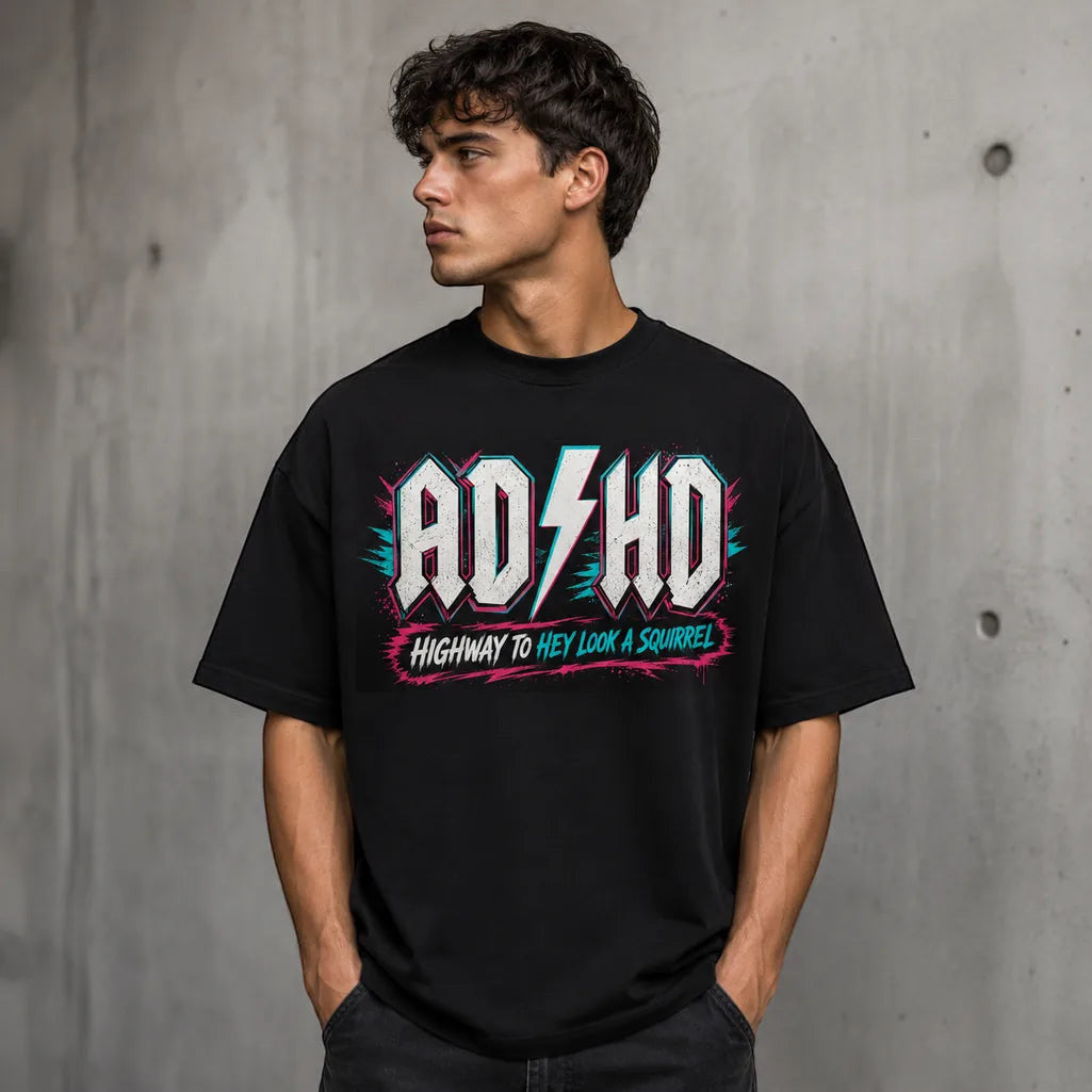 Printora UK black cotton unisex t-shirt with neon pink and turquoise ADHD Highway to Hey Look a Squirrel graphic