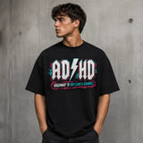 Printora UK black cotton unisex t-shirt with neon pink and turquoise ADHD Highway to Hey Look a Squirrel graphic