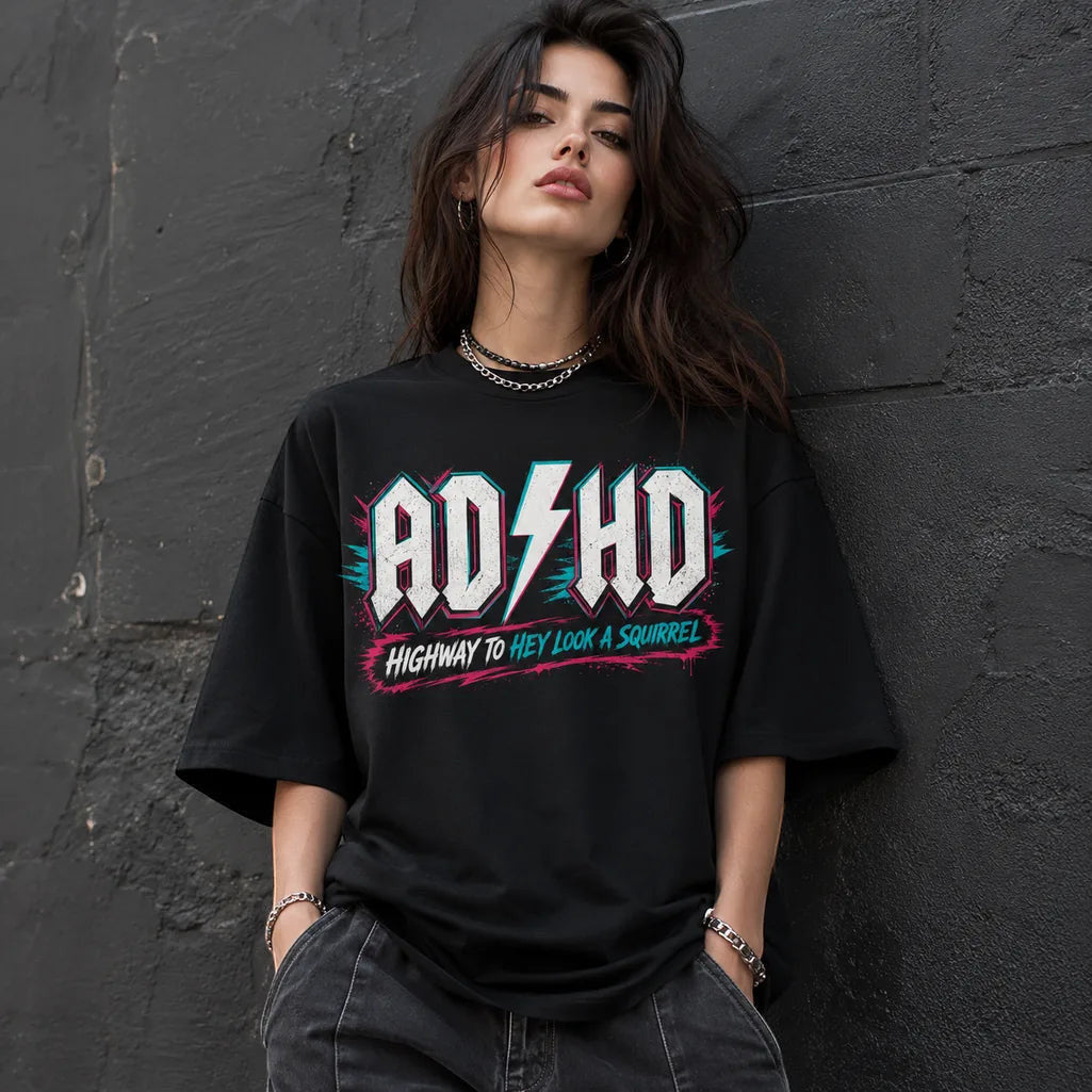 Printora UK black cotton unisex T-shirt with neon pink and turquoise ADHD Highway to Hey Look a Squirrel graphic
