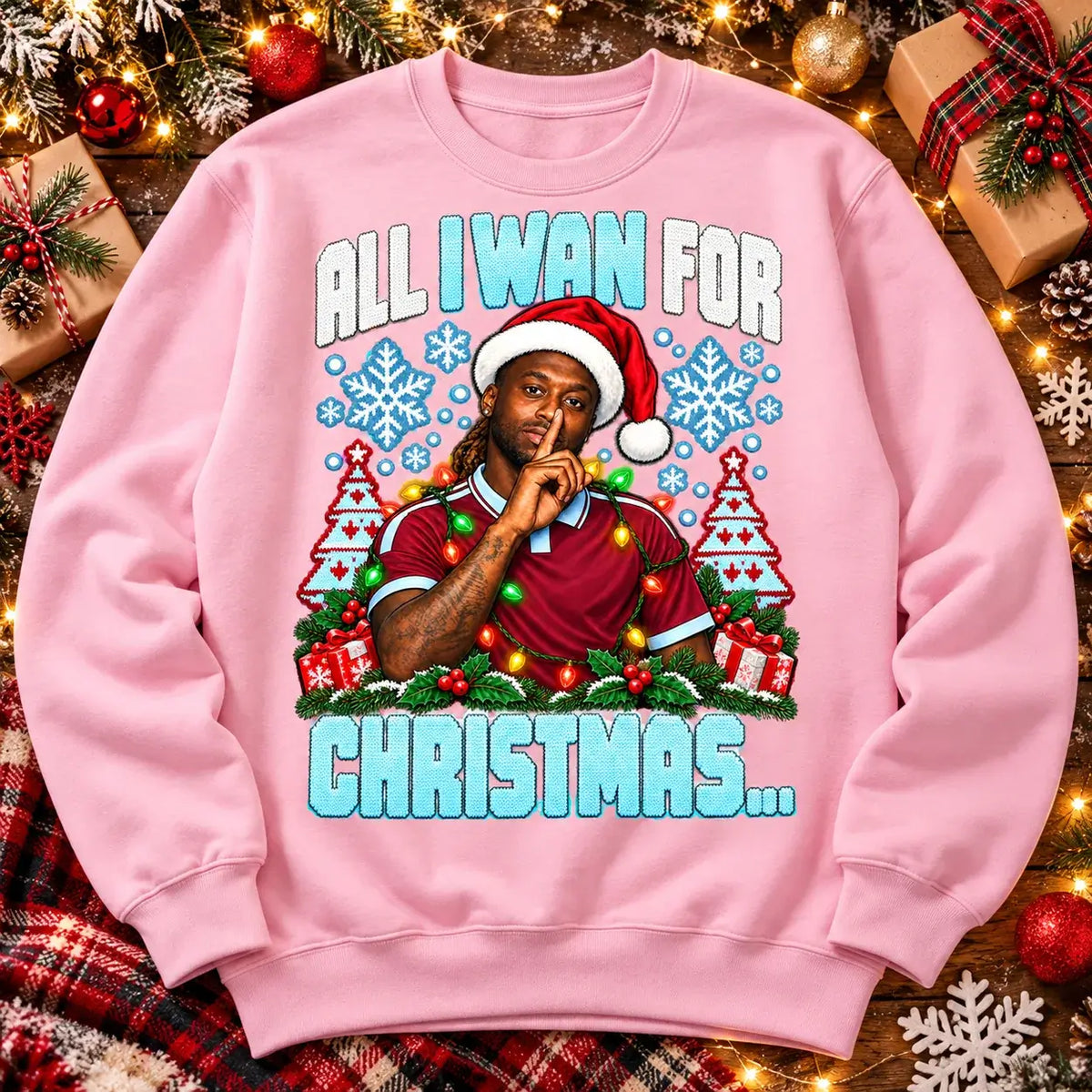 All I Wan for Christmas Aaron Wan-Bissaka funny football Christmas jumper Pink festive flat lay