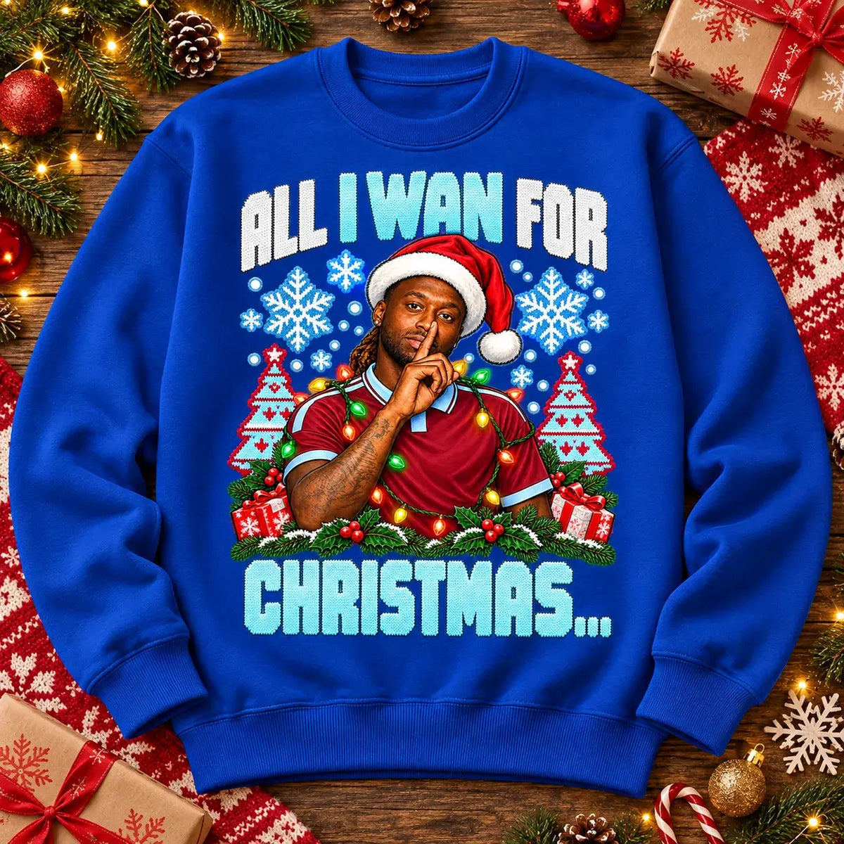 All I Wan for Christmas Aaron Wan-Bissaka funny football Christmas jumper Royal Blue festive flat lay
